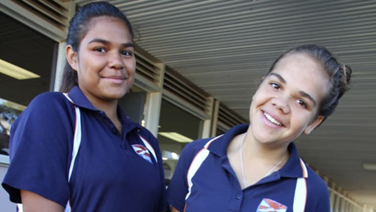 Two girls smiling