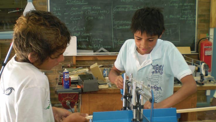 Two boys in a wood working class