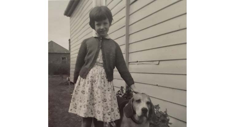 iTreack Volunteer Jan as a child with dog Soda